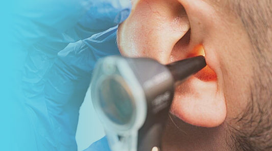 Doctor checks for Swimmer's Ear infection