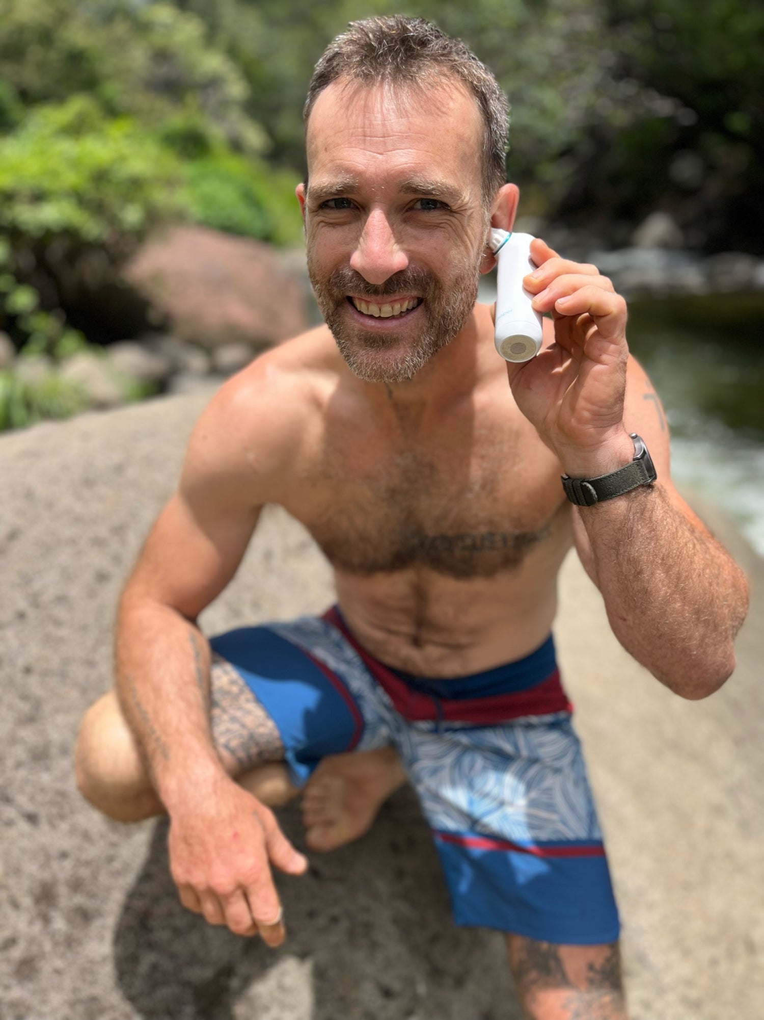 Swimmer uses the Whisper Ear Dryer to remove stuck water from his ears and prevent swimmer's ear infections.